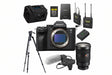 Sony camera with accessories including a lens, microphone, and battery on a white background